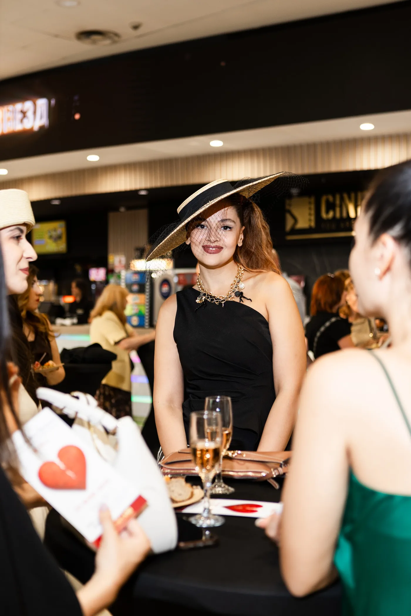 Guests meet and chat before the screening — Divorce on Credit gala premiere, July 23, 2026.